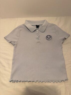Darling Wild Fable Pale Blue Ribbed Polo with Tennis Emblem